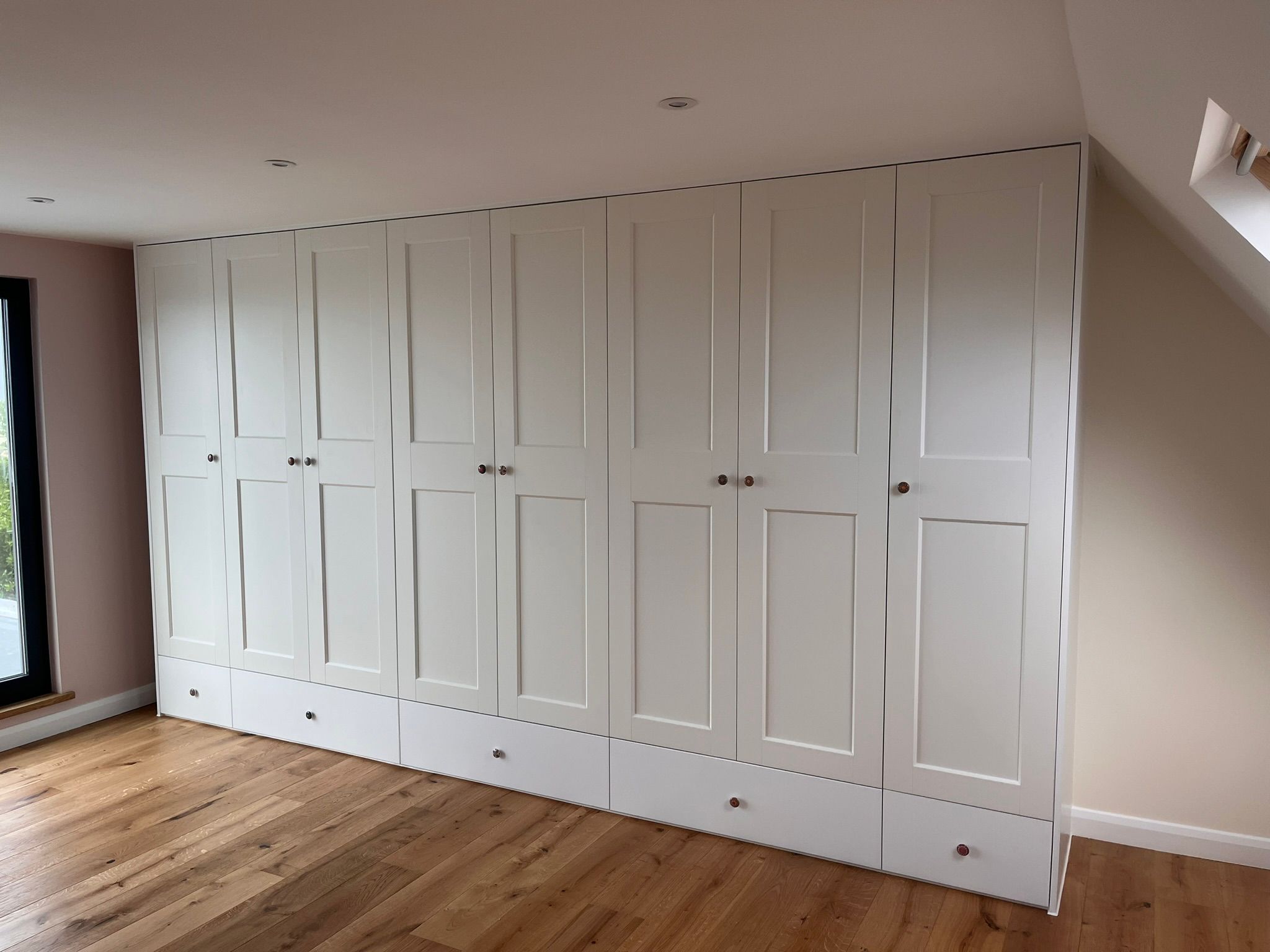 Under-stairs storage cabinetry